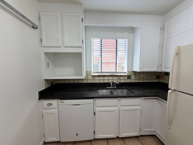 Photo - Classic Wash Park Gem with Detached Garage, Finished Basement & Stunning Great Room Addition House