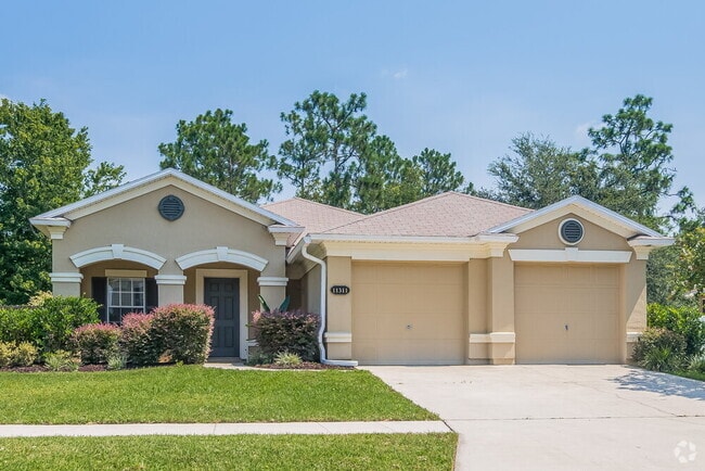 Building Photo - 11311 Justin Oaks Dr N