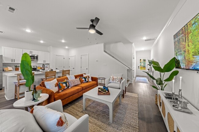 Light-filled living room perfect for relaxing or entertaining - Highline at Knoxville