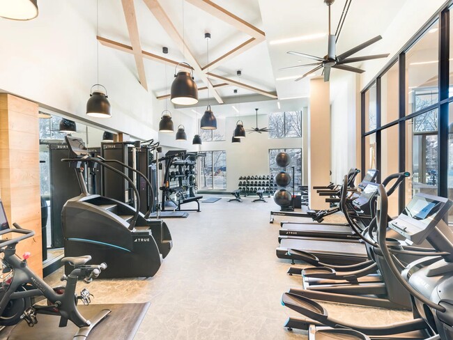 Elevate your workouts in our club-quality fitness studio with spin bikes & on-demand classes! - Modera Falls Church