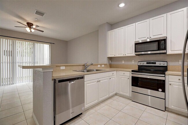 Foto del edificio - 9469 SW Purple Martin Way