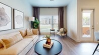 This single-story residence in Wichita, Kansas showcases a thoughtfully designed open-concept layout with contemporary finishes throughout. The living area centers around a large window dressed with layered roller shades and floor-to-ceiling drape panels, flooding the space with natural light and offering views of the surrounding neighborhood. Wood-look plank flooring runs consistently throughout, adding warmth and visual continuity.

The kitchen is a standout feature, offering an extended galley-style layout with medium-toned cabinetry, quartz countertops, a subway tile backsplash, and stainless steel appliances including a refrigerator and dishwasher. A spacious island with seating for four anchors the space, illuminated by sleek pendant lighting above.

Multiple bedrooms provide comfortable retreats, each featuring wood-look flooring, natural light from well-positioned windows, and closet storage. The rooms maintain a calm, neutral palette that complements the home's overall modern aesthetic.

The bathrooms are well-appointed with rich wood cabinetry, floor-to-ceiling storage towers, white quartz countertops, undermount sinks, and framed mirrors. Wood-look flooring continues here, maintaining design cohesion. The overall ambiance is clean, modern, and welcoming throughout.