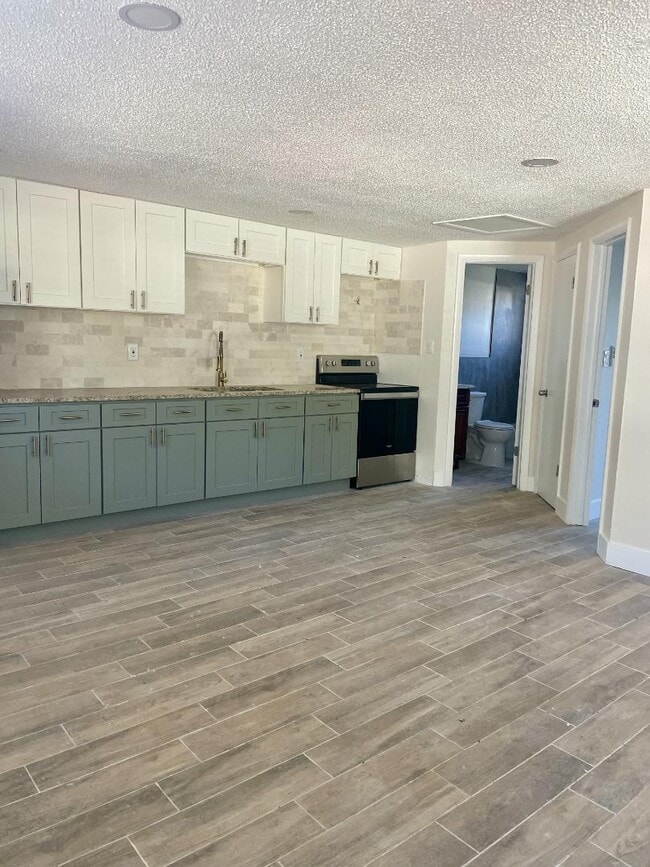 Building Photo - 1210 E 138th Ave