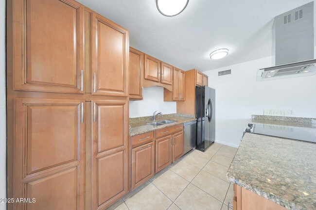 Building Photo - 8507 E Mariposa Dr
