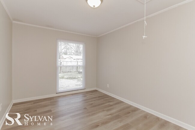Building Photo - You will love this charming brick home