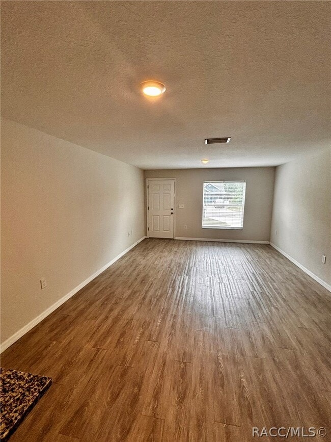 Building Photo - 9437 N Travis Dr