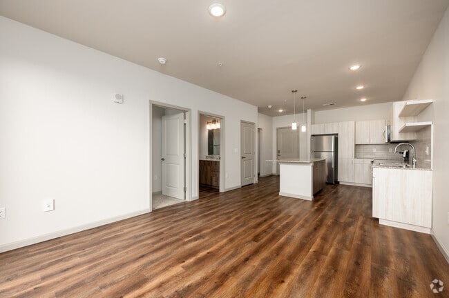 1BR, 1BA - 752SF - Living Room/Kitchen - The Leo