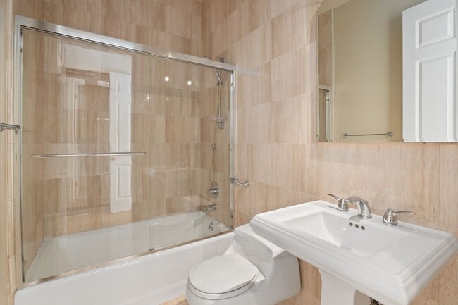 One of two guest bathrooms - 630 W Devon Pl