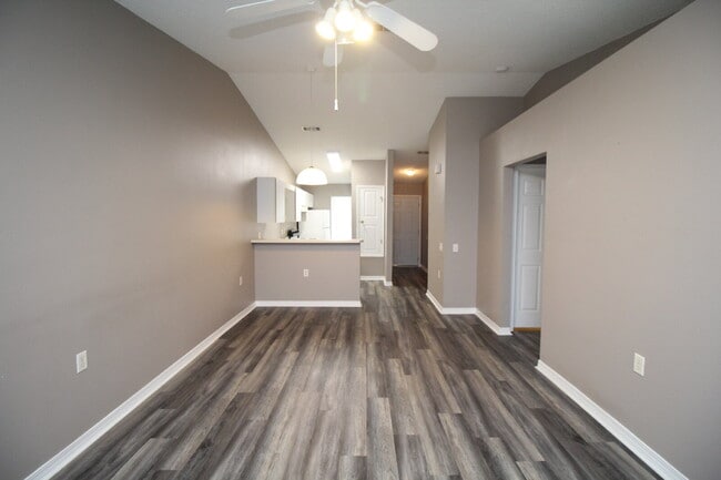Building Photo - 2BR Patio Home with LVP Flooring, Private Fenced Yard, & Convenient Blue Angel Pkwy Location Near...
