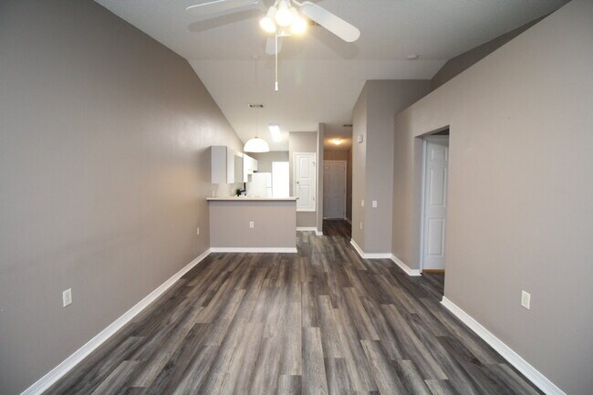 Foto del edificio - 2BR Patio Home with LVP Flooring, Private Fenced Yard, & Convenient Blue Angel Pkwy Location Near...