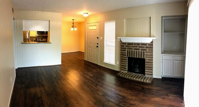 Living Room - Brick Fireplace - 3500 Tangle Brush Dr
