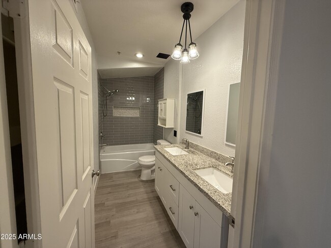 Building Photo - 9555 E Raintree Dr