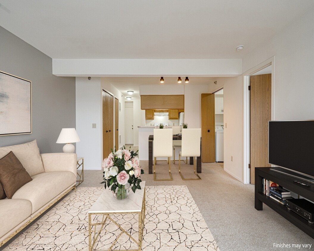 Azalea Layout Model Living Room with Kitchen View - Portsmouth Apartments