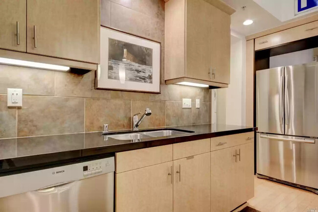 Modern kitchen with dishwasher, garbage disposal, downlighting. - 113 F St