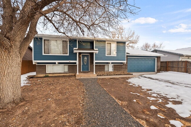 Building Photo - Spacious Split-Level Home with Finished Basement, Deck, Fenced Yard & 2-Car Garage
