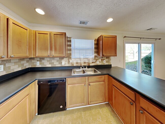 Foto del edificio - 218 Wild Flower Ln