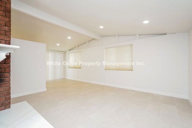 Photo - Spacious 4-Bed, 2-Bath Home with Large Bac...