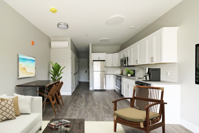 Estudio prácticamente en escena: vista desde la sala de estar de la cocina y la entrada. - The Village