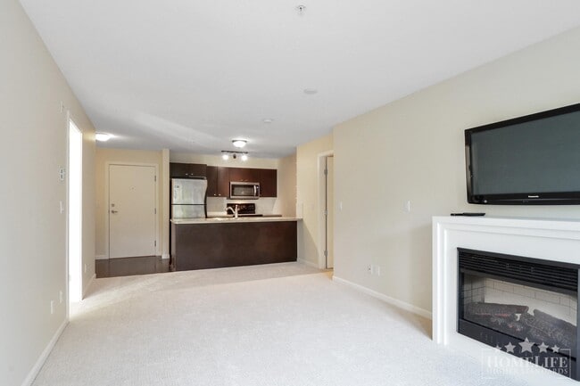 Photo du bâtiment - Introducing a charming 2 bed, 2 bath condo with a spacious patio fit for entertaining -  Located ...