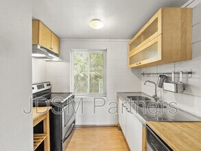 Building Photo - 2860 W 32nd Ave