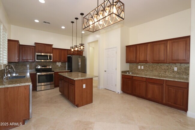 Building Photo - 10412 E Los Lagos Vista Ave