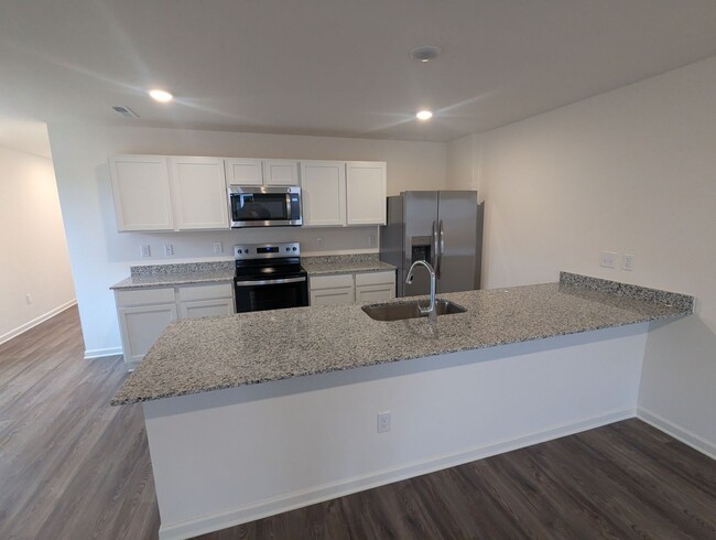 Building Photo - Brand New Corner Unit 3 Bedroom Townhome i...