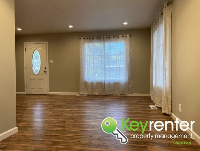 Building Photo - Modern Fircrest Gem: Sleek Design, Quartz Counters & Natural Oasis!