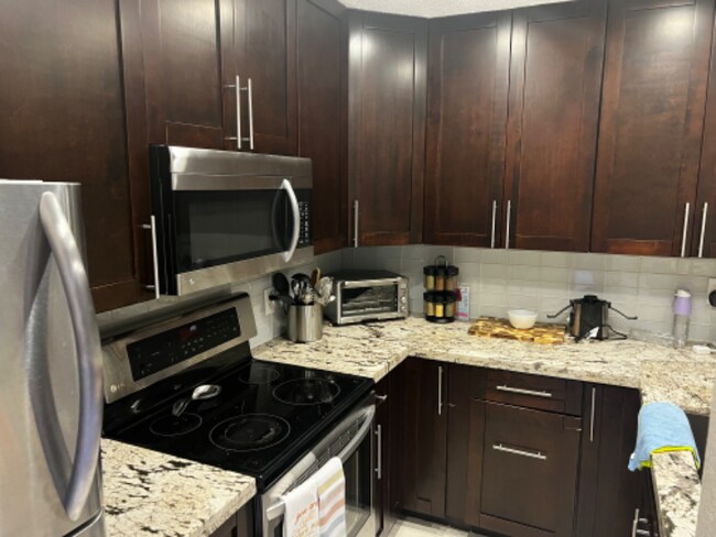 Building Photo - 3373 Cocoplum Cir
