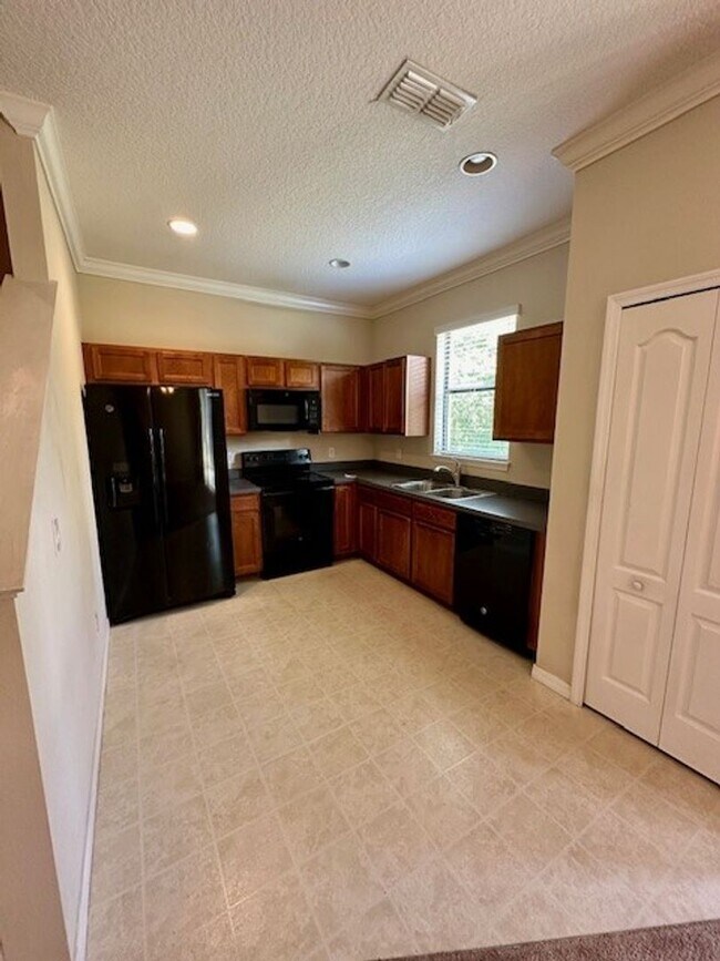 Building Photo - 3/2.5 in Tuscany Preserve! GATED community...
