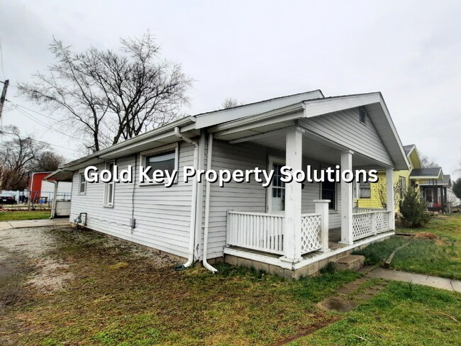 Building Photo - Cute and Cozy 2 BR 1 BA House with Carport...