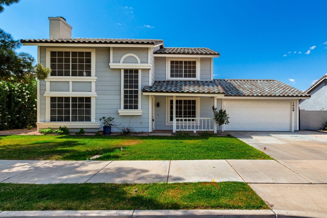 Primary Photo - Inviting 4-Bedroom Home with Included Land...