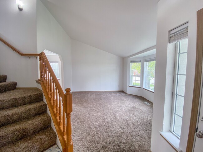 Stairs + Living room - 9010 174th Street Ct E