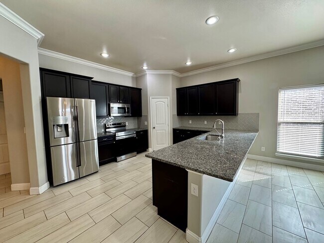 Foto del edificio - 9323 Bee Balm Ave