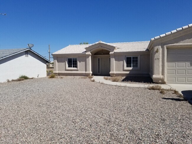 Foto del edificio - PRICE DROP! 4 bedroom, 2 bath Longterm Unf...