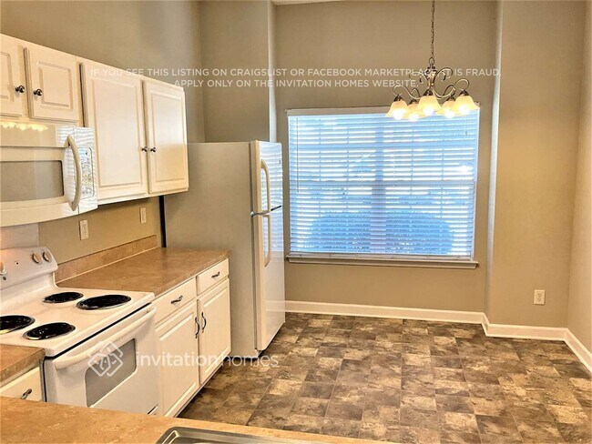 Foto del edificio - 6239 Day Lilly Ln