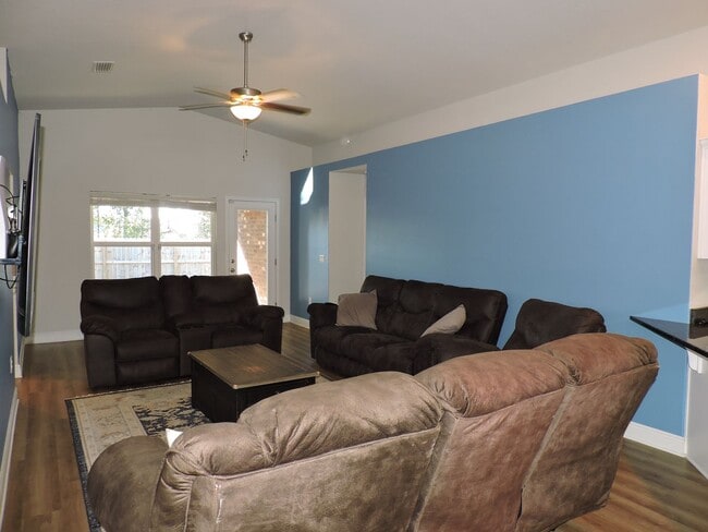 Building Photo - Almost new four bedroom home with solar pa...