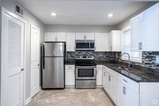 3BR, 1.5BA - 1,340SF - Kitchen - Crystal Townhomes