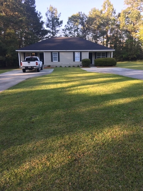 Front yard and house with Private Driveway - 6004 Susan Cir
