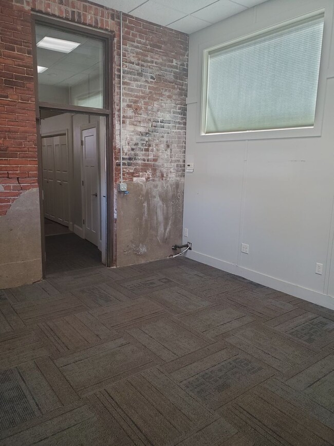 Building Photo - Awesome Downtown Moline Apartment Close to...