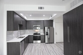 1BR, 1BA-721 SF - The Luxe Residential