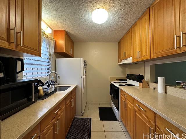 Building Photo - 98-1062-1062 Komo Mai Dr