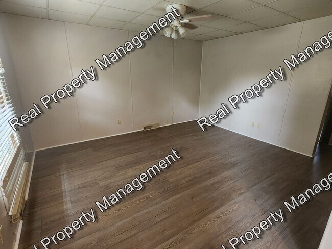 Building Photo - One Bedroom All Utilities Included