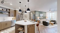Located at 1250 Hitchings Way in Durham, NC, this thoughtfully designed 2-bedroom, 3-bathroom residence offers a well-appointed single-level layout with a cohesive modern aesthetic. The open-concept kitchen flows seamlessly into the living area, anchored by a striking hexagonal island with white quartz countertops, warm wood cabinetry, stainless steel appliances, and pendant lighting overhead. Light hardwood flooring extends throughout the main living areas, complementing the neutral color palette. The living room is bright and inviting, featuring a ceiling fan, recessed lighting, and a glass door leading to a private balcony with open courtyard views framed by black metal railings. A built-in entryway nook provides convenient storage near the kitchen. The spacious primary bedroom features a distinctive sage green accent wall, ceiling fan, large windows with sheer drapery, and direct access to an additional outdoor space. The second bedroom is equally well-lit with natural light. Three bathrooms include clean, contemporary finishes with wood-toned vanities, white subway tile tub surrounds, and light tile flooring. In-unit laundry is conveniently tucked within the bathroom area. Two closets provide ample storage throughout this well-balanced and stylish Durham residence.
