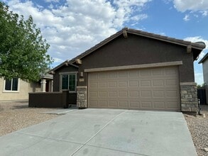 Building Photo - 10450 S Cutting Horse Dr