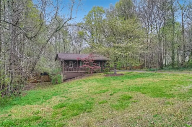 Building Photo - 4680 Whispering Woods Dr