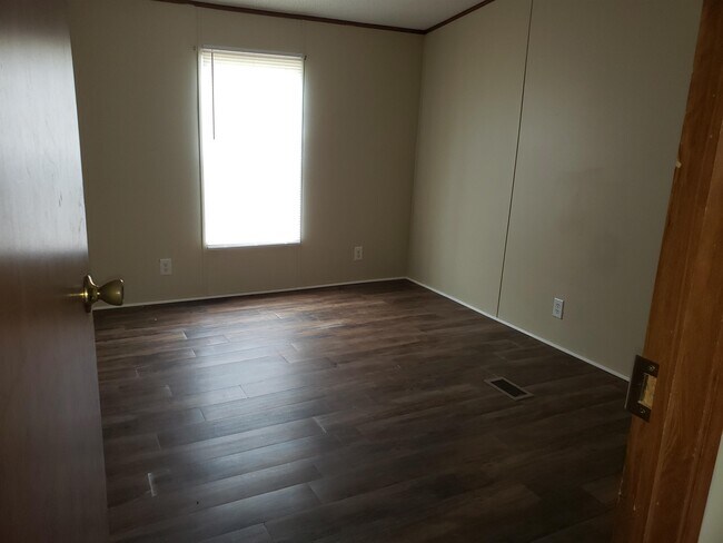 Building Photo - 6447 Swallowtail Dr