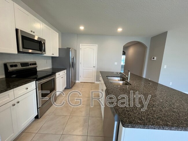 Building Photo - 5106 Fiddlewood Way