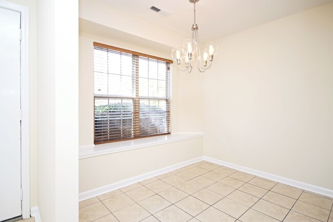 Building Photo - End-Unit Village Square Townhome (Applicat...