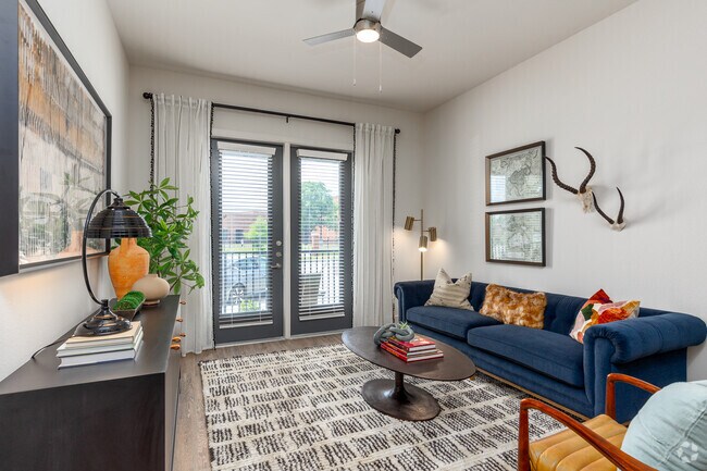 1BR, 1BA - 746SF | A2 - Living Room - The Mill Old Town