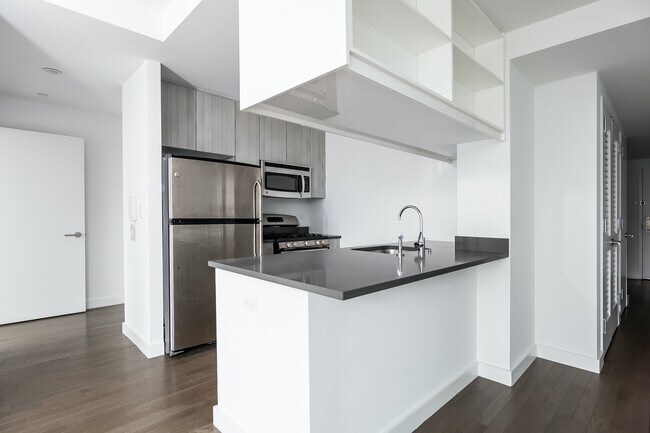 Building Photo - Bright corner one bed with W/D in unit